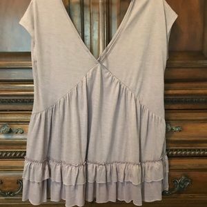 Stylish light lavender/rose shade ruffle top.